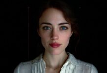 Deepfake Video Calls – How To Recognize a Fake Person On Screen Portrait of a woman split down the center with subtle digital guide lines, symbolizing the challenge of distinguishing a real person from a deepfake during a video call