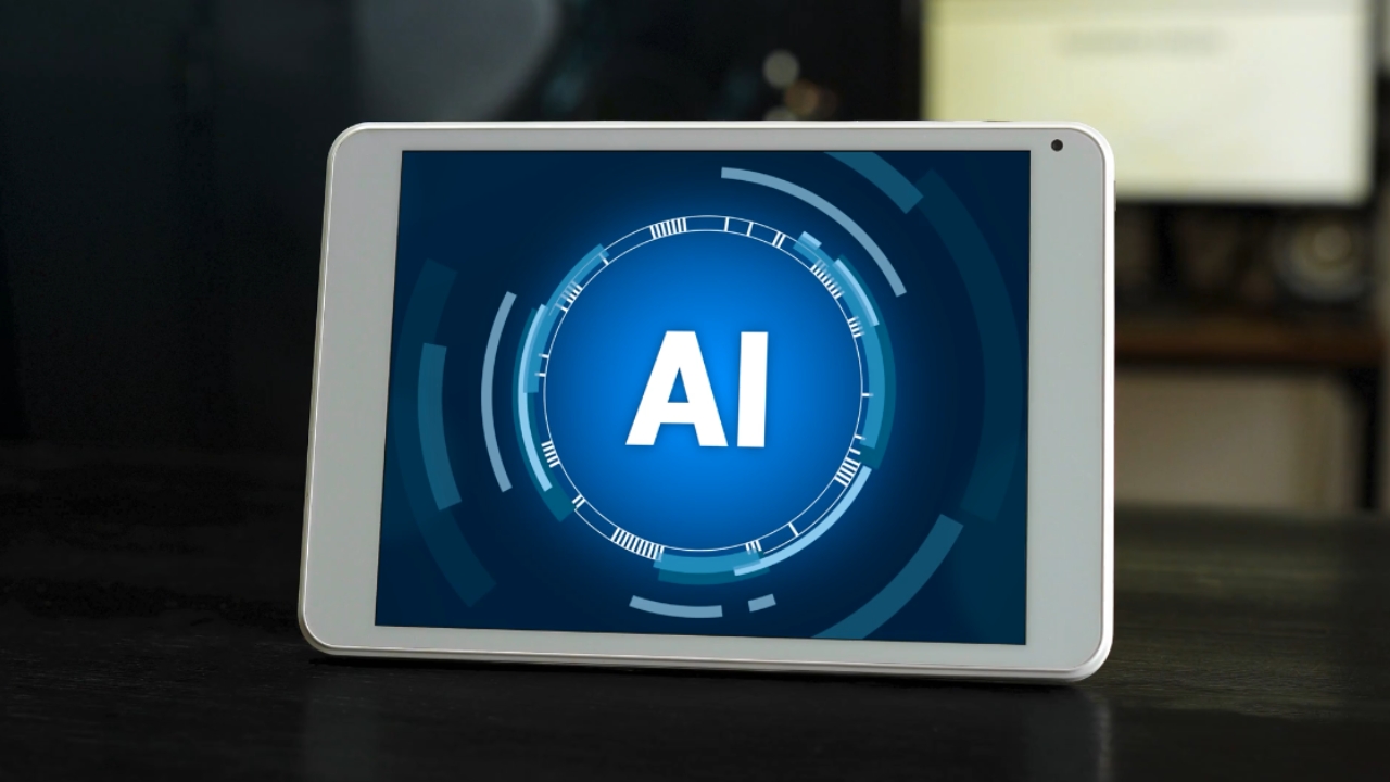 A tablet displays an AI interface on a desk